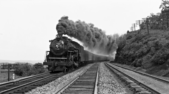 Erie Railroad 4-6-2 steam locomotive no. 2753 pulling westbound passenger train no. 1, the "Erie Limited," making smoke on descending grade just west of Black Rock and east of Port Jervis, New York, on August 27, 1939. Photograph by Donald W. Furler, © 2017, Center for Railroad Photography and Art, Furler-07-099-03