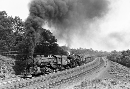 Erie Railroad 2-8-2 steam locomotives nos. 3143 and 3040 pulling a westbound freight train through the s-curve at Waldwick, New Jersey, on June 6, 1943. Photograph by Donald W. Furler, © 2017, Center for Railroad Photography and Art, Furler-10-057-02
