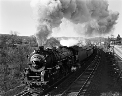 Erie Railroad 2-8-4 steam locomotive no. 3321 pulling a westbound freight train through Sloatsburg, New York, on May 12, 1940. Photograph by Donald W. Furler, © 2017, Center for Railroad Photography and Art, Furler-03-049-02