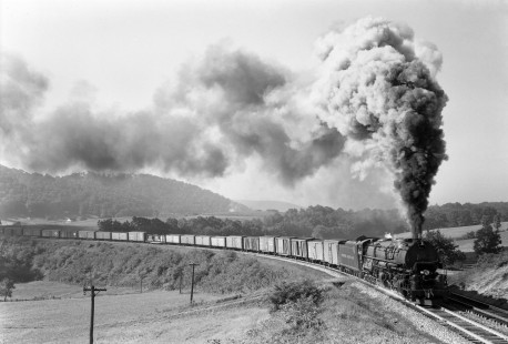 A Western Maryland Railway train led by 4-6-6-4 "Challenger"  steam locomotive no. 1204  at Helmstetter's Curve, five miles west of Cumberland, Maryland, circa 1950. Photograph by Donald W. Furler. Furler-16-007-01; © 2017, Center for Railroad Photography and Art