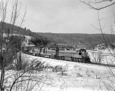 Erie Lackawanna Railroad locomotive no. 2563 leads an eastbound freight train near Pond Eddy, Pennsylvania, on February 27, 1966. Photograph by Victor Hand. Hand-EL-30-085
