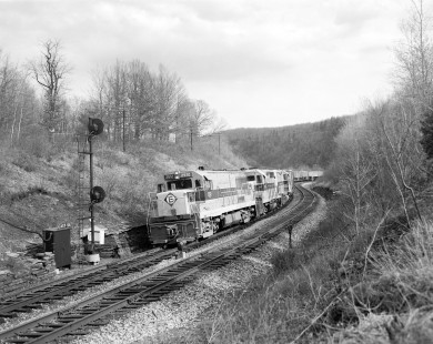 Erie Lackawanna Railroad locomotive no. 2512 leads a westbound freight train near Shohola, Pennsylvania, on  April 15, 1966. Photograph by Victor Hand. Hand-EL-30-091