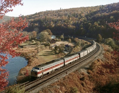 Erie Lackawanna Railroad locomotive no. 810 leads a passenger train near Pond Eddy, Pennsylvania on October 11, 1964. Photograph by Victor Hand. Hand-EL-C30-001.JPG