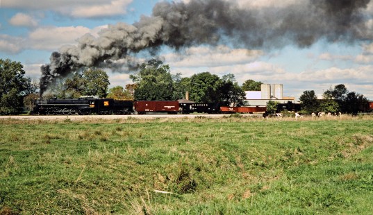 Southbound Ohio Central Railroad freight train with former Grand Trunk Western steam locomotive no. 6325 passing a farm at Barrs Mills, Ohio, on October 7, 2002. Photograph by John F. Bjorklund, © 2016, Center for Railroad Photography and Art. Bjorklund-78-10-15