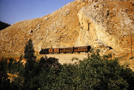 Syrian Railways steam locomotive no. 130-751 pulling 3 passenger cars in Al-Zabadani, Syria on July 21, 1991. Photograph by Fred M. Springer, © 2014, Center for Railroad Photography and Art.  Springer-Hedjaz-ZimZam(1)-10-20