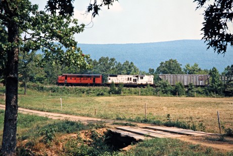 Westbound Kansas City Southern Railway freight train near Cauthron, Arkansas, on July 19, 1977. Photograph by John F. Bjorklund, © 2016, Center for Railroad Photography and Art. Bjorklund-61-17-06