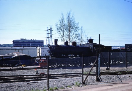 A single steam locomotive in a train yard in Gothenburg, Västra Götaland, Norway, on June 11, 1989. Photograph by Fred M. Springer, © 2014, Center for Railroad Photography and Art. Springer-Scan-Swiss-York-10-08