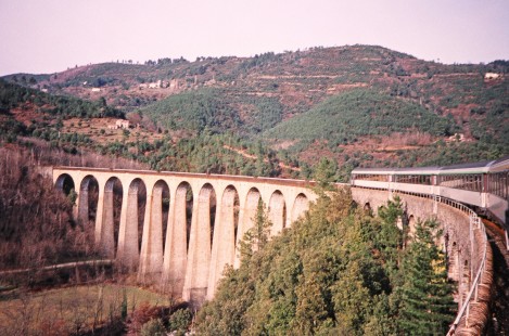 A train crosses the curved track over the Chamboriguad Viaduct in Chamboriguad, Languedoc-Roussillon, France, on March 1, 1999. Photograph by Fred M. Springer, © 2014, Center for Railroad Photography and Art. Springer-FRA-SD&AE-C&TS(1)-03-24