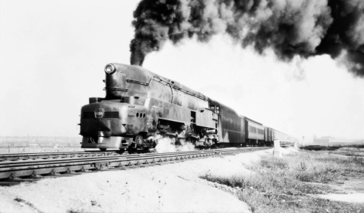 Pennsylvania Railroad (PRR) passenger train led 4-4-4-4 steam locomotive #6110 at unidentified location, circa 1940. Photograph by Robert A. Hadley.   © 2017, Center for Railroad Photography and Art