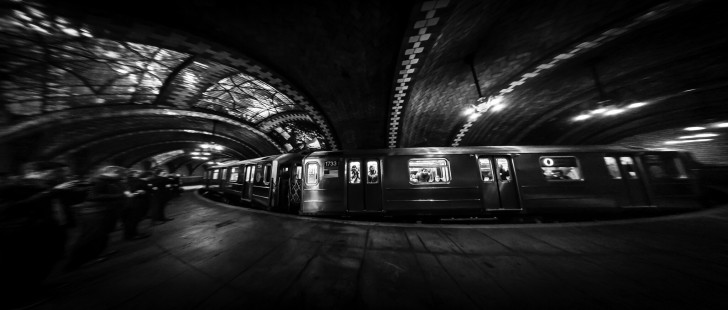 In New York City’s closed City Hall station on March 4, 2017, a crowd on the left is taking pictures of subway riders. Photographer Dennis Livesey used a full-frame camera with an 8-15mm fisheye lens set at 9mm. Processing of the image included digital straightening of the circular image.

Read more about the <a href="http://www.railphoto-art.org/awards/2017-awards/" rel="nofollow">2017 John E. Gruber Creative Photography Awards Program</a>.
