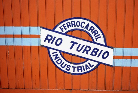 A Ramal Ferro Industrial de Río Turbio logo on business car at Río Turbio, Santa Cruz, Argentina, on October 18, 1990.  Photograph by Fred M. Springer. © 2014, Center for Railroad Photography and Art, Springer-SOAM1-19-26