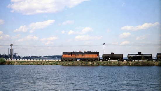 The Milwaukee Road SD7 diesel locomotive no. 515 leading a local freight train across the Lake Monona Causeway in Madison, Wisconsin, on May 3, 1968. Photograph by Thomas F. McIlwraith, McIlwraith-01-016-15, © 2018, Center for Railroad Photography & Art, <a href="http://www.railphoto-art.org" rel="noreferrer nofollow">www.railphoto-art.org</a>