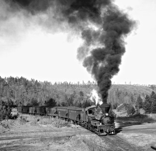 Wide view of seven-car Twin Seams Mining Company train climbing grade south of tipple at Kellerman, Alabama, in December 1959. Crew made two trips on a good day (no derailments). Photograph by J. Parker Lamb, © 2016, Center for Railroad Photography and Art. Lamb-02-036-12