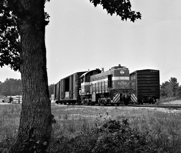 Mississippian Railway's steam era ended around 1964, when the road bought a used Alco switcher, which replaced the 2-8-0s at much less cost. This is Lamb's only shot of the diesel at work (in Fulton, Mississippi). The steamers quickly became active at historical rail operations in the U.S. and Canada. Photograph by J. Parker Lamb, © 2016, Center for Railroad Photography and Art. Lamb-02-030-07