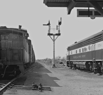 Local freight waits for Montgomery-bound West Point Route passenger train no. 31 to clear station at Opelika, Alabama, in February 1955. Photograph by J. Parker Lamb, © 2016, Center for Railroad Photography and Art. Lamb-02-020-06