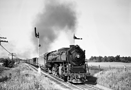 Lehigh and Hudson River Railway 4-8-2 steam locomotive no. 12 pulling a freight train west past semaphore signals at Burnside, New York, on June 23, 1946. Photograph by Donald W. Furler, Furler-01-013-02, © 2017, Center for Railroad Photography and Art