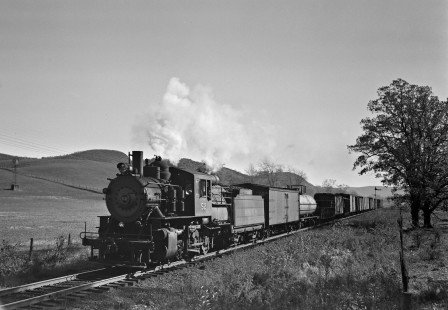 Lehigh and Hudson River Railway 2-8-0 camelback steam locomotive no. 52 pulling the afternoon local freight train east from Warwick to Maybrook at Sugar Loaf, New York, on October 22, 1944. Photograph by Donald W. Furler, Furler-01-017-02, © 2017, Center for Railroad Photography and Art