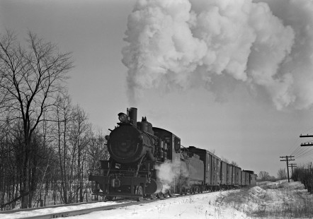 Lehigh and Hudson River Railway 2-8-0 camelback steam locomotive no. 60 pulling a four-car freight train east at Burnside, New York, on February 23, 1946. Photograph by Donald W. Furler, Furler-01-018-02, © 2017, Center for Railroad Photography and Art