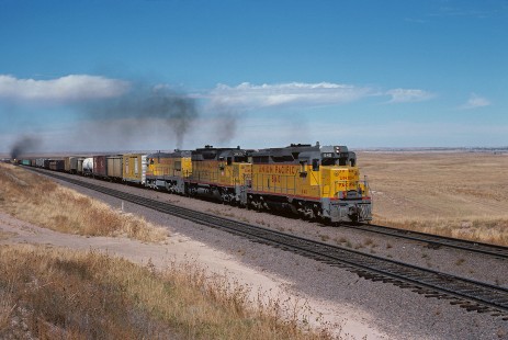 Union Pacific Railroad locomotive no. 840 hauls eastbound freight at Speer, Wyoming, on October 2, 1977. Photograph by William Botkin, BOTKINW-19-WT-183 © 1977, William Botkin.