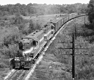 Pair of ex-Nashville, Chattanooga and St. Louis Railway GP7 locomotives head out of Bruceton, Tennessee, with a Louisville and Nashville Railroad local freight train for Union City, Tennessee, in September 1959. Photograph by J. Parker Lamb, © 2016, Center for Railroad Photography and Art. Lamb-01-149-09
