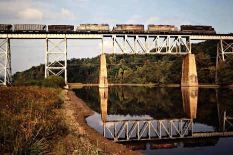 Southbound Clinchfield Railroad freight train crossing bridge in Marion, North Carolina, on October 17, 1980. Photograph by John F. Bjorklund, © 2015, Center for Railroad Photography and Art. Bjorklund-41-25-10