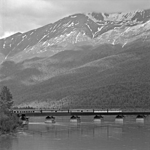 Alaska Railroad EMD FP7A locomotive no. 1514 leads a B unit and passenger train over a bridge, c. 1973. Photograph by Leo King, © 2015, Center for Railroad Photography and Art. King-03-032-005
