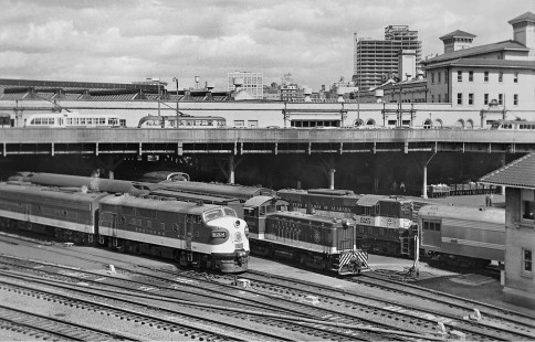 Northbound West Point Route <i>Crescent</i> passenger train pulls past the tower at Atlanta's Terminal Station as Southern Railway's slower northbound <i>Peach Queen</i> awaits departure after the streamlined <i>Crescent</i> on October 16, 1954. Photograph by J. Parker Lamb, © 2016, Center for Railroad Photography and Art. Lamb-01-116-09