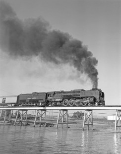 Union Pacific Railroad steam locomotive no. 8444 leads westbound excursion train to Laramie, Wyoming,  via Dent Branch in Welby, Colorado, on May 30, 1969. Photograph by Victor Hand. Hand-UP-64-170.JPG