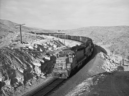 Union Pacific Railroad diesel locomotive no. 413 leads a westbound freight train in Apex, Nevada, on November 15, 1967. Photograph by Victor Hand. Hand-UP-64-009.JPG