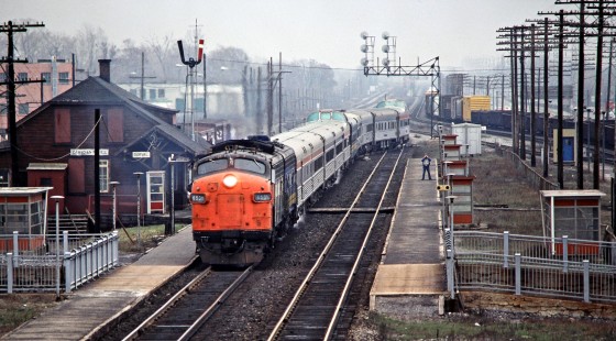 Westbound VIA Rail Canada passenger train no. 1, the <i>Canadian</i>, on Canadian Pacific Railway track at station in Dorval, Quebec, on April 26, 1980. Photograph by John F. Bjorklund, © 2015, Center for Railroad Photography and Art. Bjorklund-37-11-15
