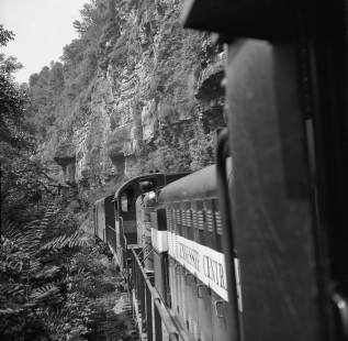 View from 3rd unit of Tennessee Central Railway freight train headed on 160-mile run to Emory Gap, Tennessee, in April 1962. After leaving yard in Nashville, train climbs grade on narrow shelf blasted out of mountain side. Photograph by J. Parker Lamb, © 2016, Center for Railroad Photography and Art. Lamb-02-027-03