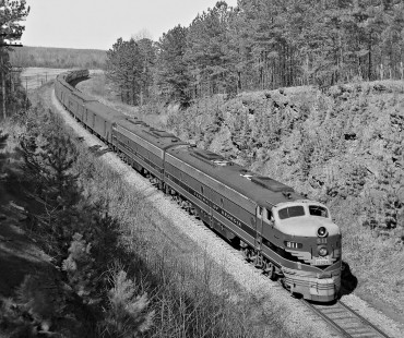 Southbound Central of Georgia Railway <i>Seminole</i> passenger train dives through cut north of Opelika, Alabama, in August 1954. Photograph by J. Parker Lamb, © 2016, Center for Railroad Photography and Art. Lamb-02-010-07