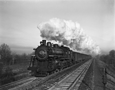 Erie Railroad 4-6-2 steam locomotive no. 2527 pulling eastbound passenger train no. 160 through Passaic Junction at Elmwood Park, (formerly known as East Paterson), New Jersey on November 20, 1940. Photograph by Donald W. Furler, © 2017, Center for Railroad Photography and Art, Furler-03-027-02
