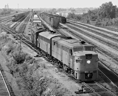 Louisville-bound Louisville and Nashville Railroad train departs Radnor Yard in Nashville, Tennessee, as another freight awaits clearance in August 1965. Photograph by J. Parker Lamb, © 2016, Center for Railroad Photography and Art. Lamb-01-142-07