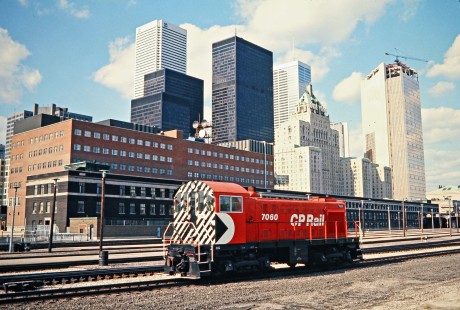 Canadian Pacific Railway S2 locomotive no. 7060 in front of skyline at Toronto, Ontario, on May 8, 1976. Photograph by John F. Bjorklund, © 2015, Center for Railroad Photography and Art. Bjorklund-37-02-10