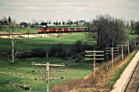 Westbound Canadian Pacific Railway freight train at Lobo, Ontario, on May 9, 1983. Photograph by John F. Bjorklund, © 2015, Center for Railroad Photography and Art. Bjorklund-37-21-15