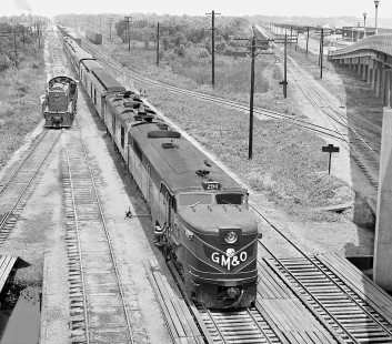 Southbound Gulf, Mobile and Ohio Railroad <i>Gulf Coast Rebel</i> approaches the station in Mobile, Alabama, in June 1955. Line to right is Southern Railway. Photograph by J. Parker Lamb, © 2016, Center for Railroad Photography and Art. Lamb-01-134-03