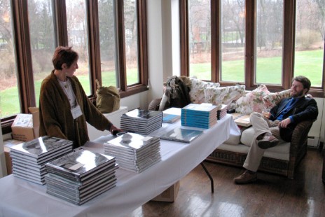 Volunteers Wendy Burton-Brouws and Alexander Craghead are ready for book sales and signings at the reception. Photo by Scott Lothes.
