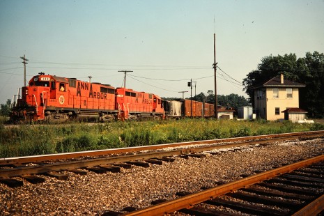 Northbound Ann Arbor Railroad freight train at Detroit, Toledo and Ironton Railroad crossing in Diann, Michigan, on July 30, 1977. Photograph by John F. Bjorklund, © 2015, Center for Railroad Photography and Art. Bjorklund-03-21-04