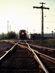 Northbound Ann Arbor Railroad freight train crossing the Chesapeake & Ohio's former Pere Marquette line in Alma, Michigan, on June 5,  1976. Photograph by John F. Bjorklund, © 2015, Center for Railroad Photography and Art. Bjorklund-01-13-05