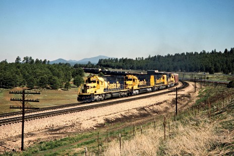 Santa Fe Railway freight train in  East Bellemont, Arizona, on June 6, 1990. Photograph by John F. Bjorklund, © 2015, Center for Railroad Photography and Art. Bjorklund-05-24-04
