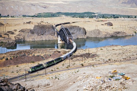 Westbound Burlington Northern Railroad freight train crossing the Columbia River in Rock Island, Washington, on July 19, 1974. Photograph by John F. Bjorklund, © 2015, Center for Railroad Photography and Art. Bjorklund-08-15-03