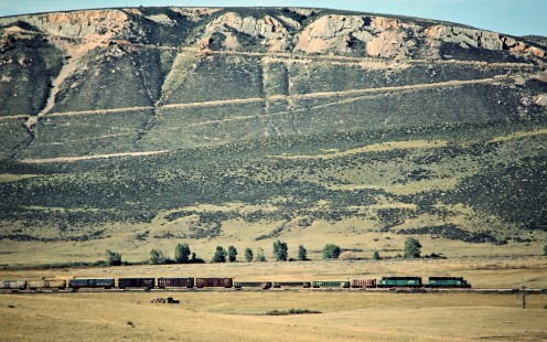 Westbound Burlington Northern Railroad freight train in Horse Creek, Wyoming, on September 30, 1984. Photograph by John F. Bjorklund, © 2015, Center for Railroad Photography and Art. Bjorklund-12-27-15