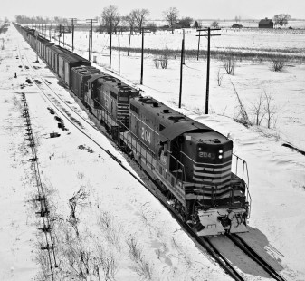 Chicago & Eastern Illinois Railroad extra freight train from St. Louis to Chicago approaching the tower at Glover, Illinois (east of Urbana), in December 1959. Photograph by J. Parker Lamb, © 2015, Center for Railroad Photography and Art. Lamb-01-041-07