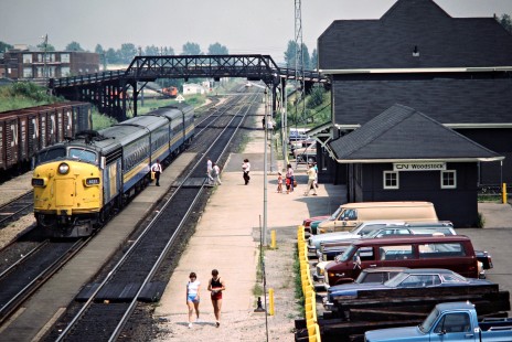 Westbound VIA Rail passenger train on the Canadian National Railway in Woodstock, Ontario, on July 14, 1984. Photograph by John F. Bjorklund, © 2015, Center for Railroad Photography and Art. Bjorklund-21-20-12