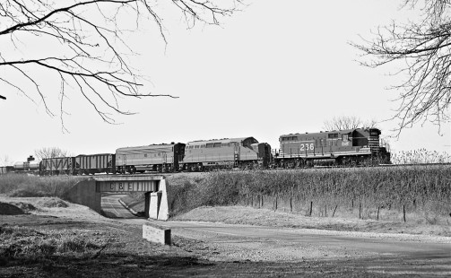 Chicago & Eastern Illinois Railroad northbound freight train behind three models of EMD diesel locomotives leaving Danville, Illinois, in December 1959. Photograph by J. Parker Lamb, © 2015, Center for Railroad Photography and Art. Lamb-01-043-04