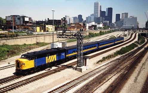 Westbound VIA Rail passenger train on the Canadian National Railway in Toronto, Ontario, on May 27, 1988. Photograph by John F. Bjorklund, © 2015, Center for Railroad Photography and Art. Bjorklund-22-24-08