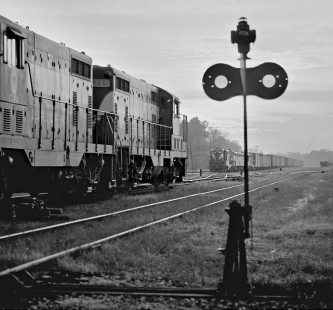 Southbound Seaboard Air Line Railroad freight train enters yard at Raleigh, North Carolina, passing a northbound extra train awaiting clearance in July 1962. Photograph by J. Parker Lamb, © 2016, Center for Railroad Photography and Art. Lamb-01-069-06
