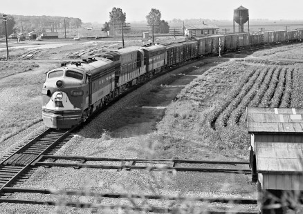 Wabash Railroad Chicago-bound freight train no. 84 curving northward at Bement, Illinois, as seen from the Illinois Terminal bridge on April 11, 1959. Photograph by J. Parker Lamb, © 2015, Center for Railroad Photography and Art. Lamb-01-040-04