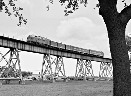 Northbound Kansas City Southern Railway local passenger train no. 10 leaves Baton Rouge, Louisiana, after crossing Mississippi River in May 1960. Photograph by J. Parker Lamb, © 2016, Center for Railroad Photography and Art. Lamb-02-071-04